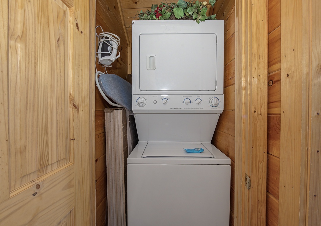 Keep your clothes fresh with this convenient in-unit stackable washer and dryer combo tucked neatly away in your private laundry closet.
