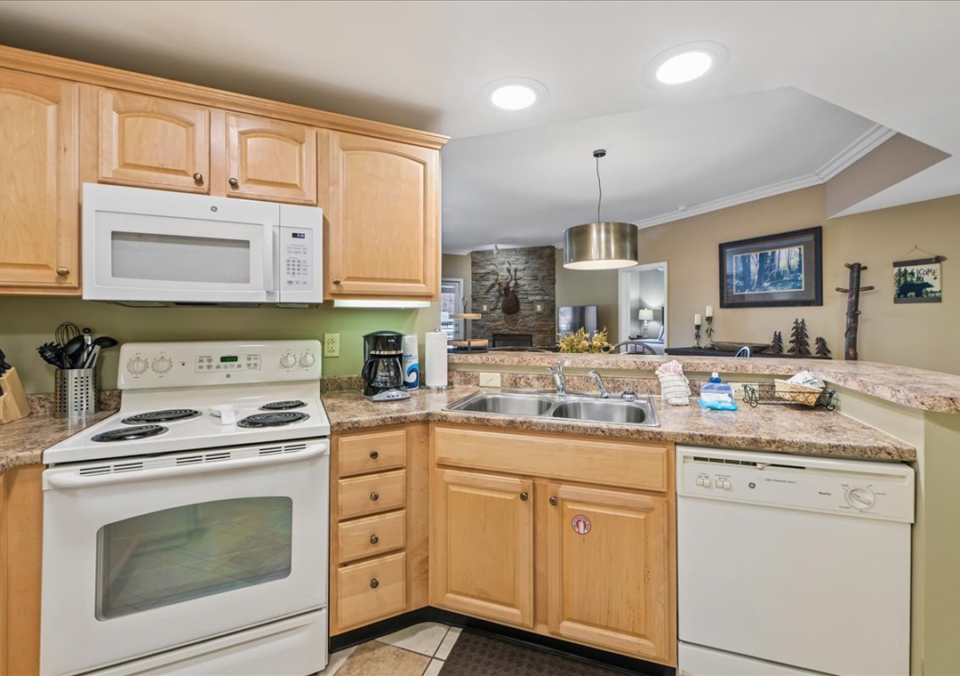 Your fully equipped kitchen awaits with granite counters, modern appliances, and open layout perfect for cooking memorable meals together.