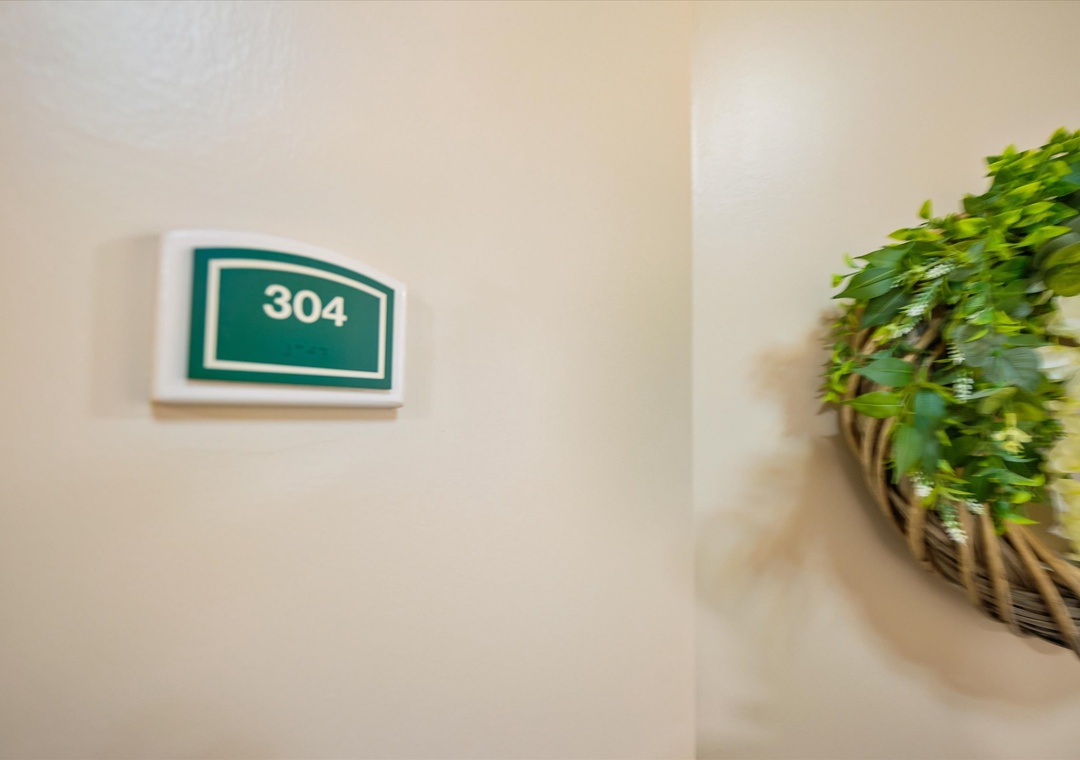 Room 304 awaits your arrival with a welcoming touch of greenery to brighten your stay.