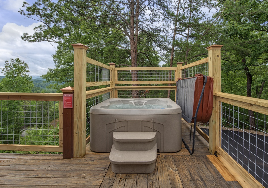 Soak in your private hot tub while surrounded by lush mountain forest and fresh air—your perfect outdoor retreat for relaxation and scenic beauty.
