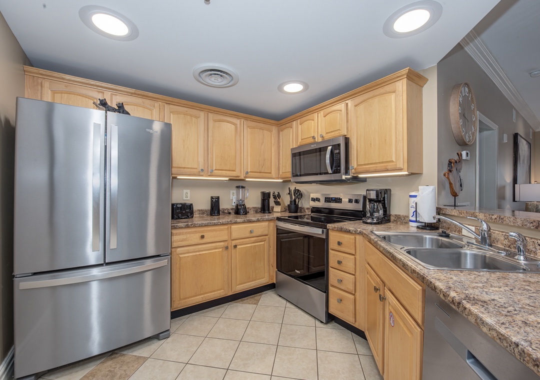 Your fully equipped kitchen features stainless steel appliances and granite countertops, perfect for preparing meals during your stay.