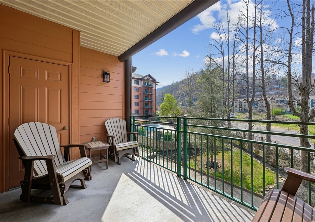 Unwind on your private balcony with comfortable seating and mountain views that stretch across the peaceful valley below.