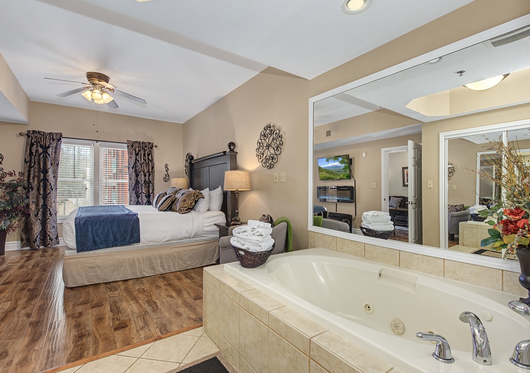 Unwind in your luxury suite featuring a king bed and private jetted tub - perfect for romantic evenings after exploring the area.