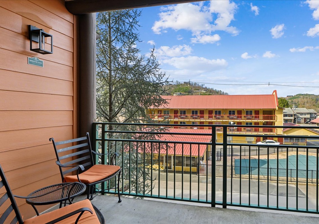 Step onto your private balcony to enjoy morning coffee with scenic neighborhood views and fresh mountain air.