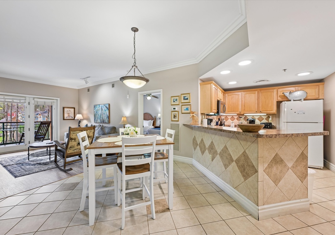 Your spacious open-concept kitchen flows seamlessly into the dining and living areas, perfect for gathering with loved ones over home-cooked meals.