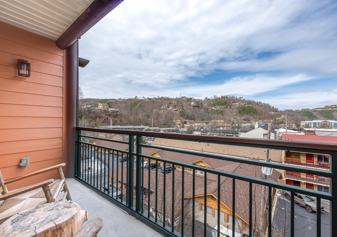 Step onto your private balcony and take in sweeping views of the rolling hills and charming town below.