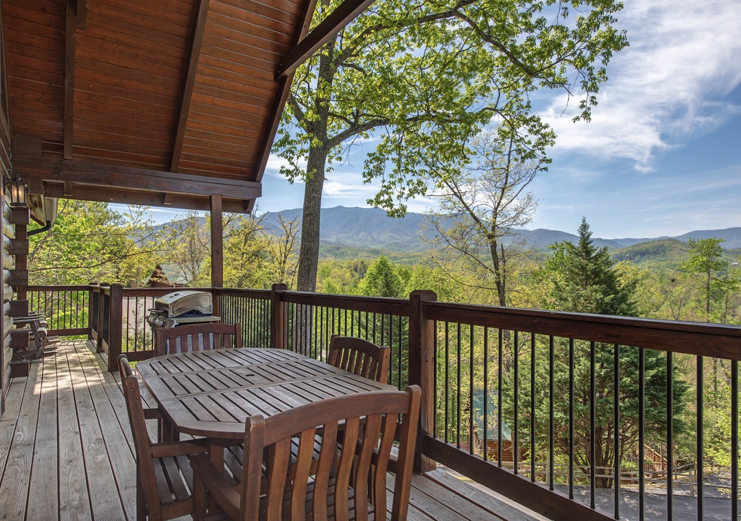 Your private deck offers breathtaking mountain views where you'll savor morning coffee and evening barbecues surrounded by nature's beauty.