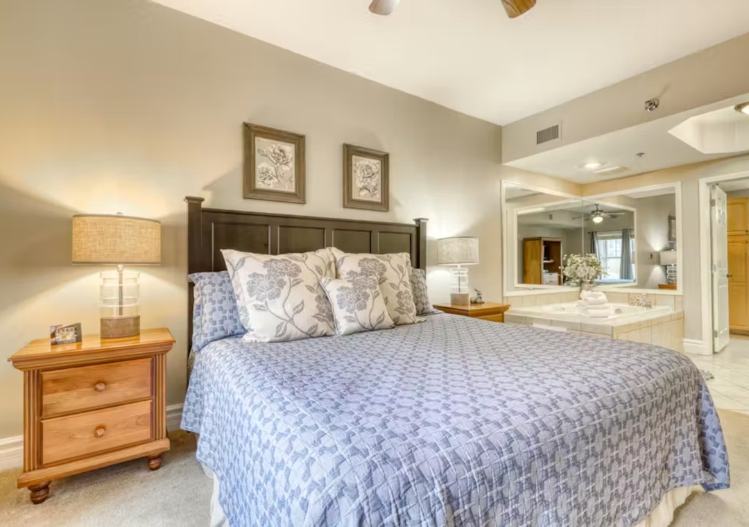 Unwind in your spacious master bedroom featuring a luxurious en-suite bath, perfect for romantic evenings.