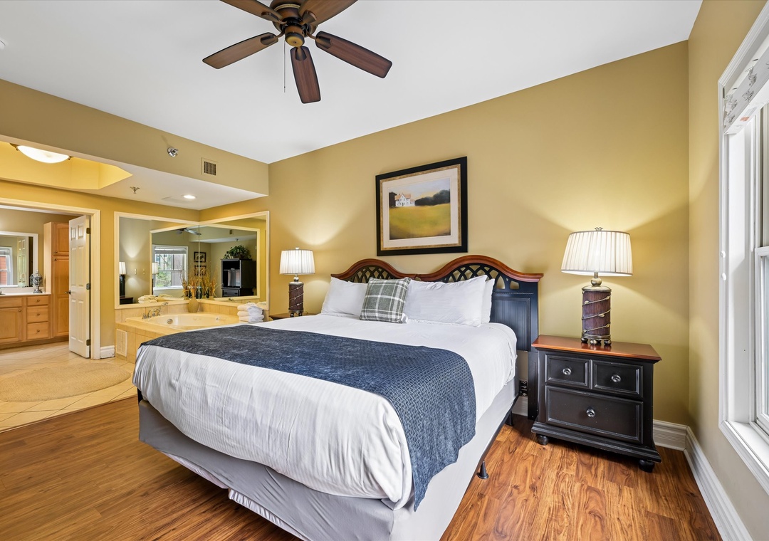 Unwind in your spacious bedroom with elegant furnishings, a king bed with crisp linens, and a luxurious ensuite bathroom for ultimate comfort.