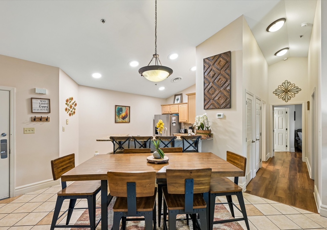 Gather around this warm dining table where conversations flow and meals become memories in your home away from home.