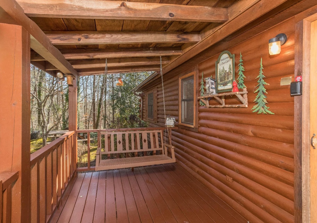 A property nestled in a peaceful wooded setting, surrounded by natural landscape and mature trees.