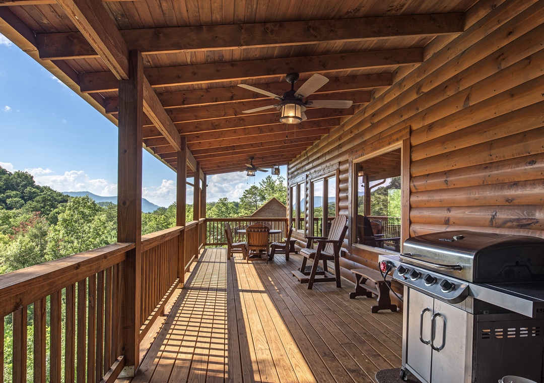 Take in the sweeping mountain views from your covered deck, where you can unwind in a rocker with a cold drink or fire up the grill for an outdoor feast.