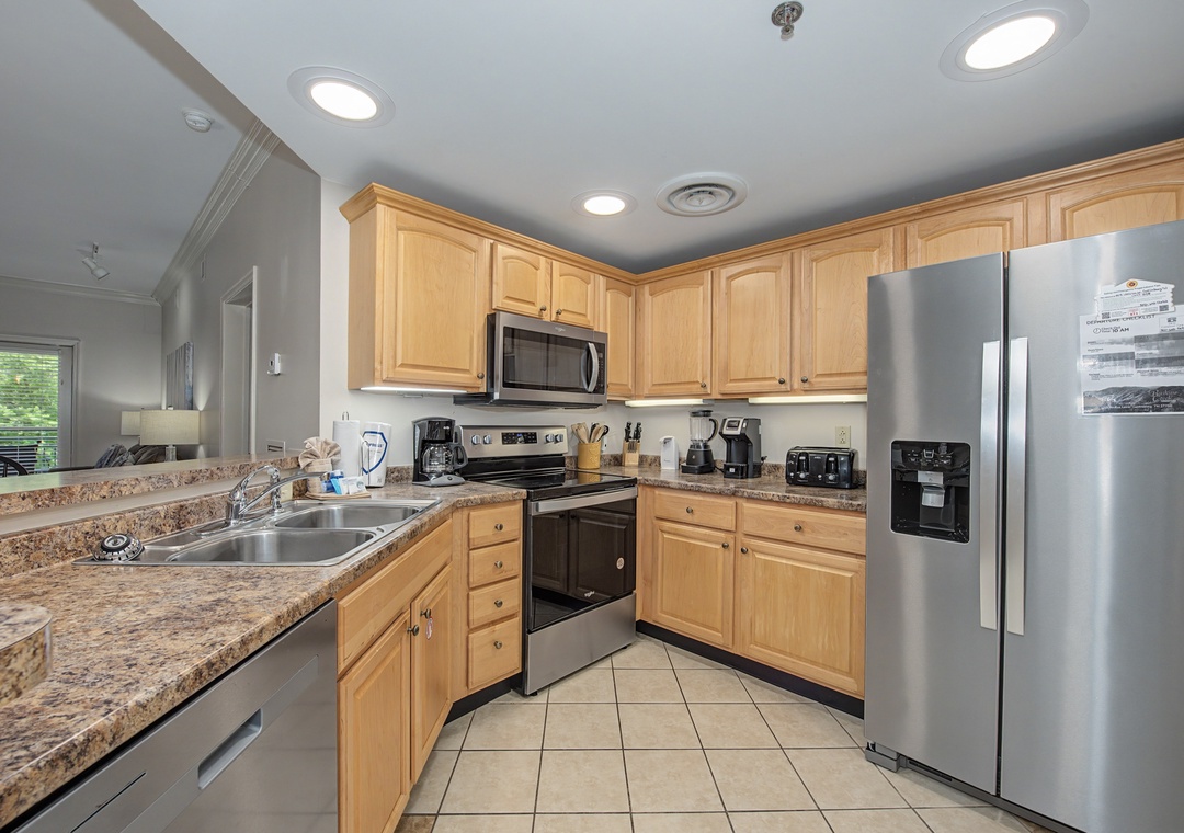 Your fully equipped kitchen features granite countertops, stainless appliances, and all the essentials for preparing memorable meals during your stay.