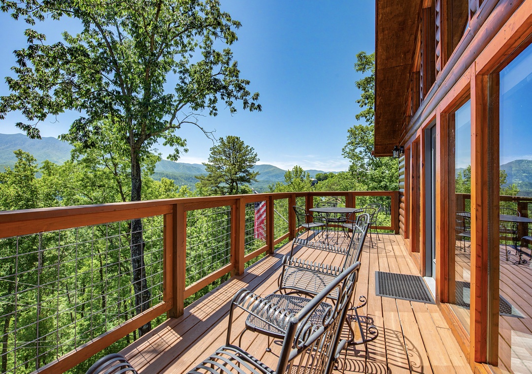 Relax on your private deck with stunning mountain panoramas stretching endlessly before you, where fresh air and peaceful forest surroundings create the perfect escape.
