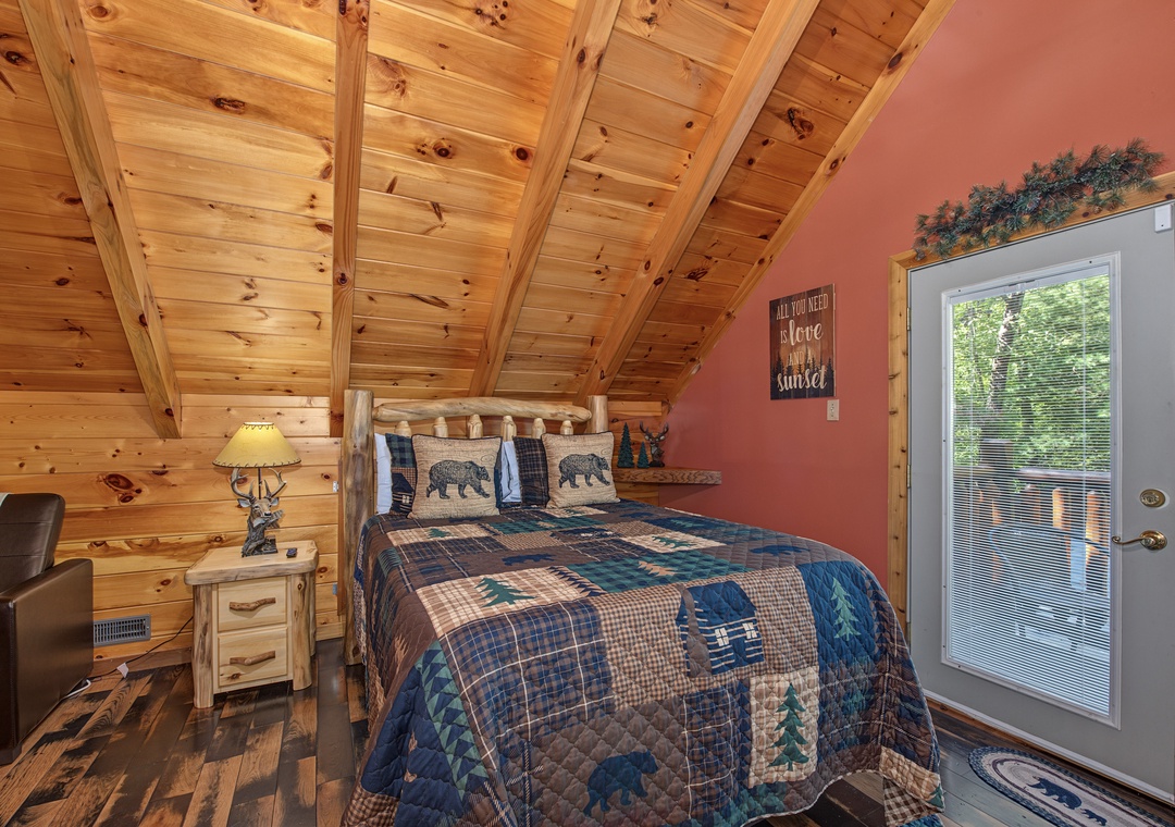 Cozy up in your rustic retreat with vaulted wood ceilings and charming woodland-themed decor. Step out your private door to embrace nature right from your room.