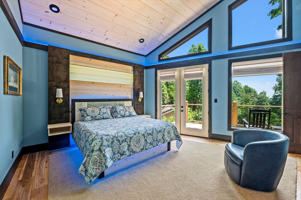 Drift off in your tranquil bedroom surrounded by soft blue tones and sunlight streaming through expansive windows. Step onto your private balcony to greet the morning and breathe in the fresh air.