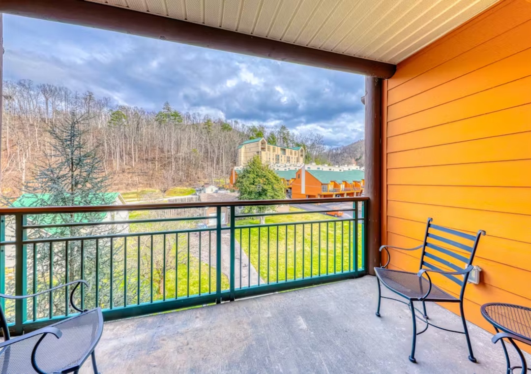 Step onto your private balcony and breathe in the fresh mountain air while enjoying panoramic views of the surrounding valley and hills.