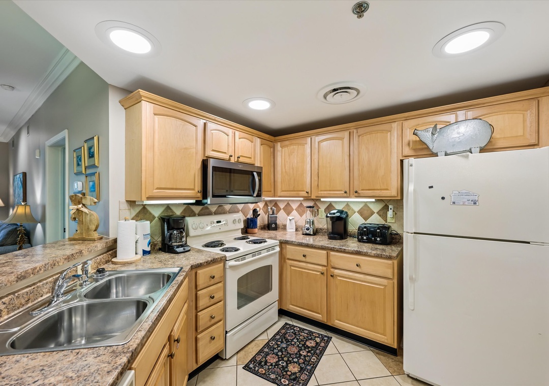 Your fully-equipped kitchen awaits with granite counters, stainless appliances, and everything you need to create memorable meals during your stay.