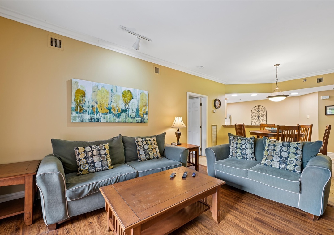 Unwind in your spacious living room with plush sofas and warm décor, perfect for relaxing after exploring.