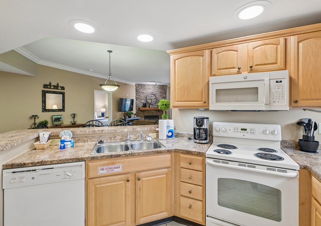 Your fully equipped kitchen awaits with granite countertops, coffee maker, and all the essentials for home-cooked meals during your stay.
