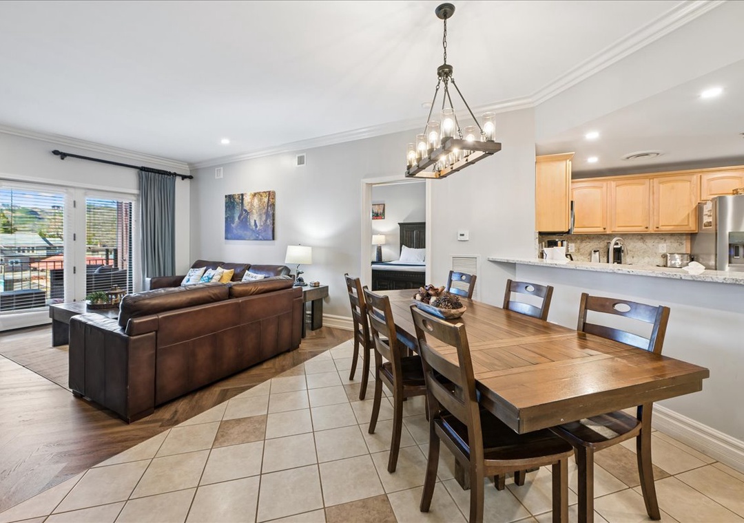 Gather around your spacious dining table while the kitchen's granite counters invite culinary adventures in this open-concept haven.