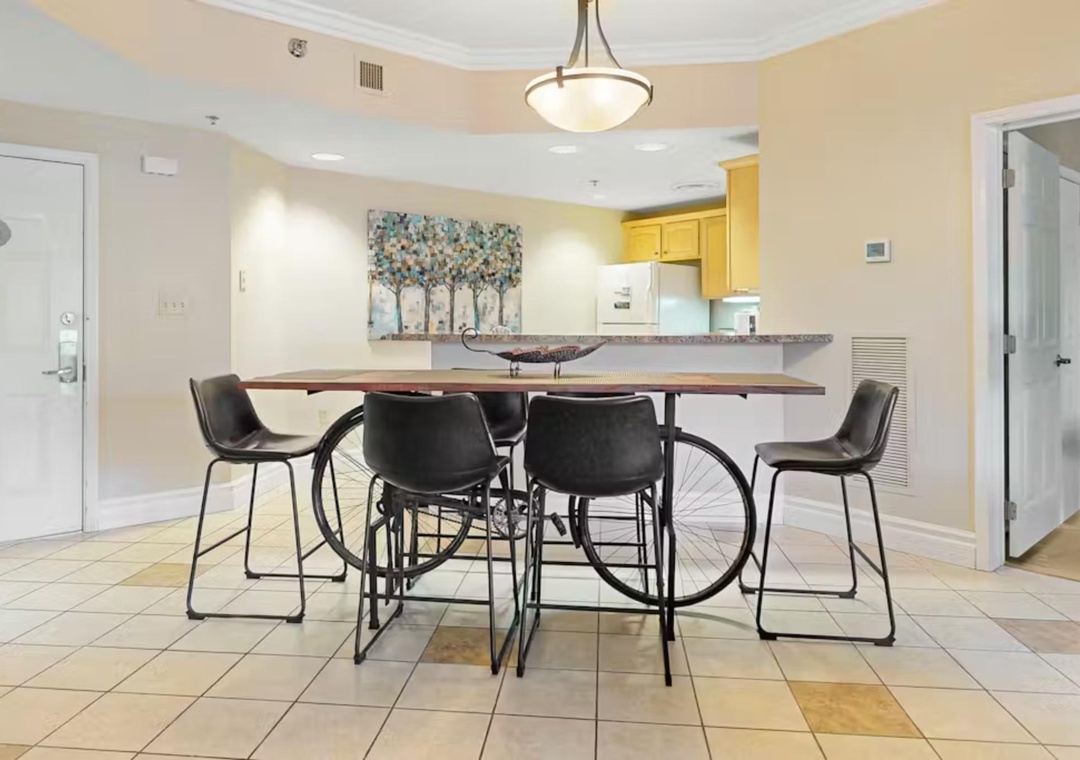 Gather around this stylish dining table where you'll share meals and memories. The open kitchen makes entertaining effortless.