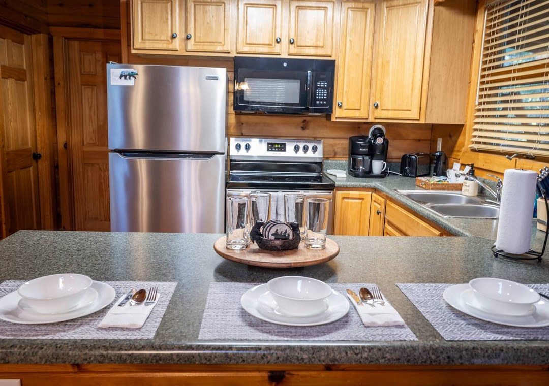 Your fully equipped kitchen invites culinary adventures with stainless steel appliances, granite counters, and everything needed for memorable meals together.
