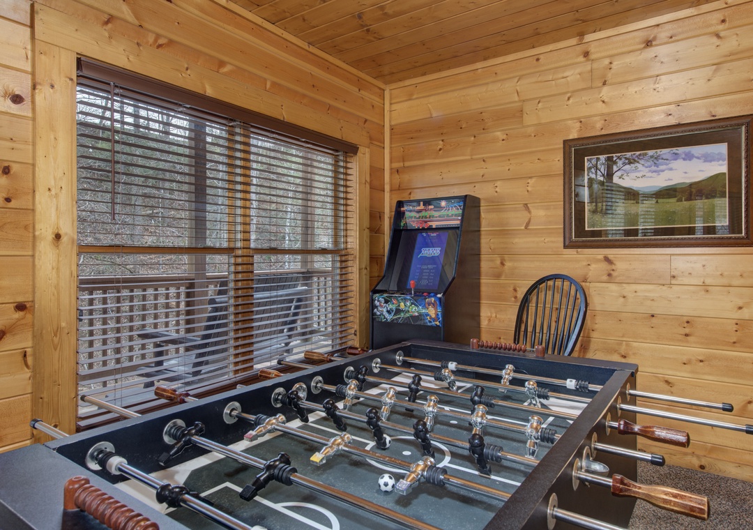 Challenge friends to foosball and arcade games in your private game room, where rustic charm meets endless entertainment.