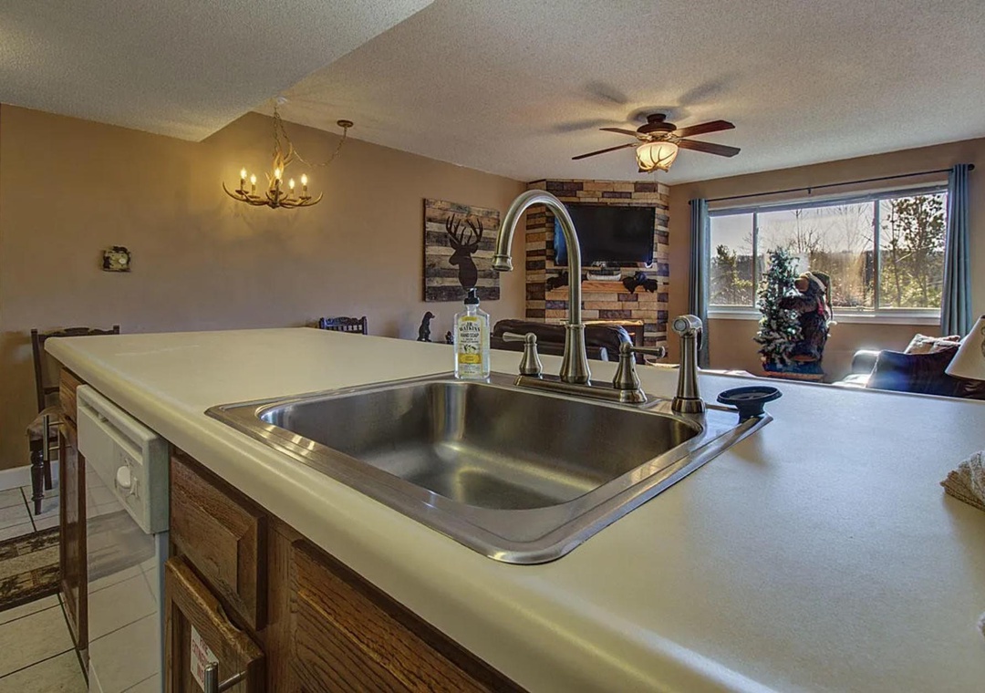 Your kitchen island invites culinary adventures with ample prep space, while the open layout connects you to the cozy dining area.