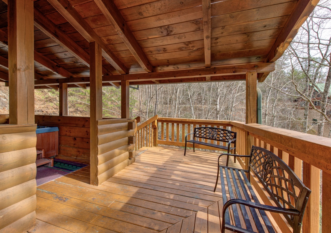 Relax on your private covered deck surrounded by peaceful forest views, perfect for morning coffee or evening reflection.