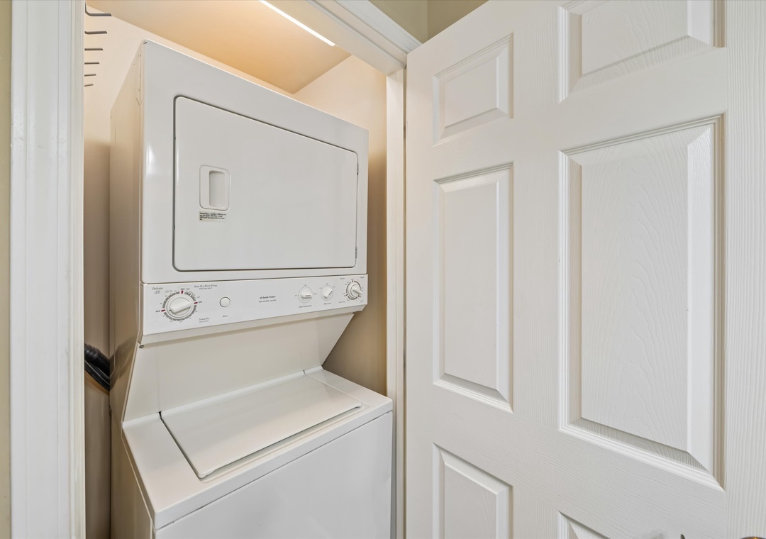 Your own in-unit laundry means fresh clothes throughout your stay, tucked away in this convenient closet space.