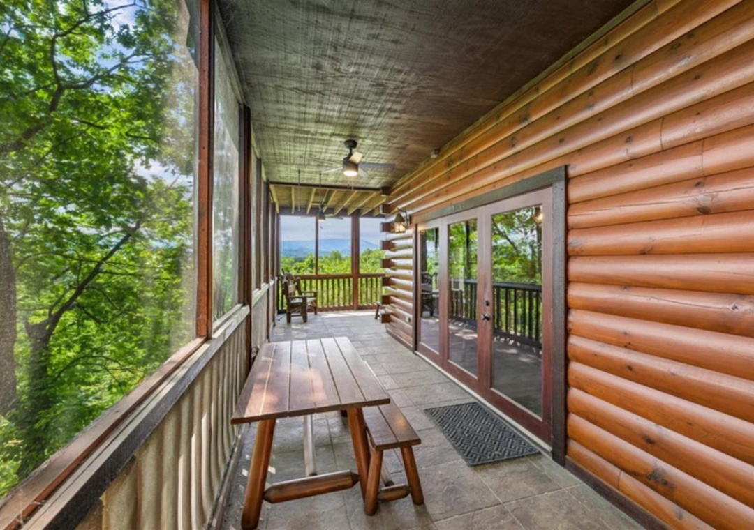 Step onto your private screened porch and let the panoramic mountain views take your breath away. Enjoy meals at the rustic picnic table while surrounded by lush forest and fresh air.