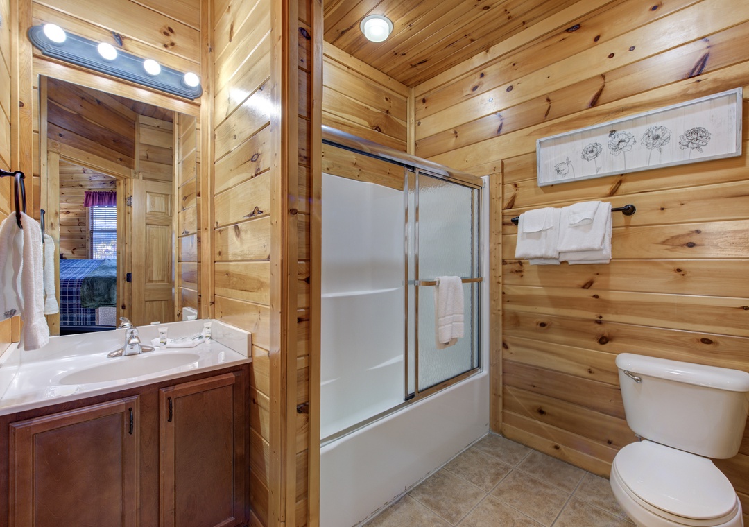 Freshen up in your private bathroom with a tub-shower combo, clean towels, and plenty of space to get ready for your mountain adventures.
