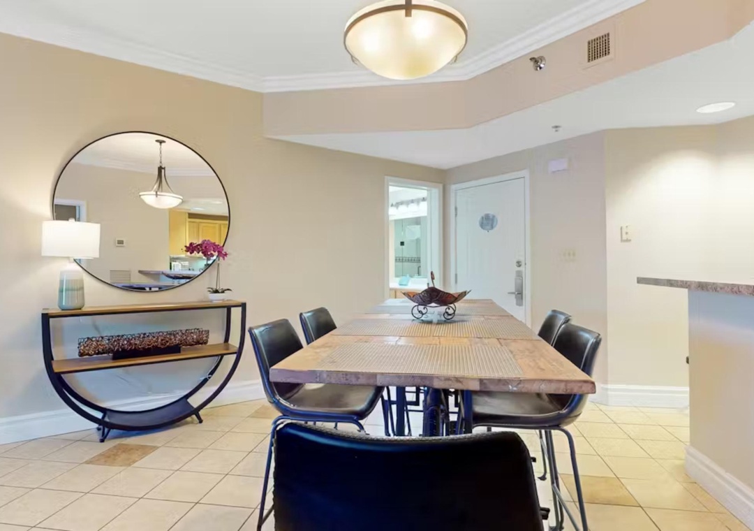 Gather around your spacious dining table for memorable meals with loved ones in this elegantly appointed space.