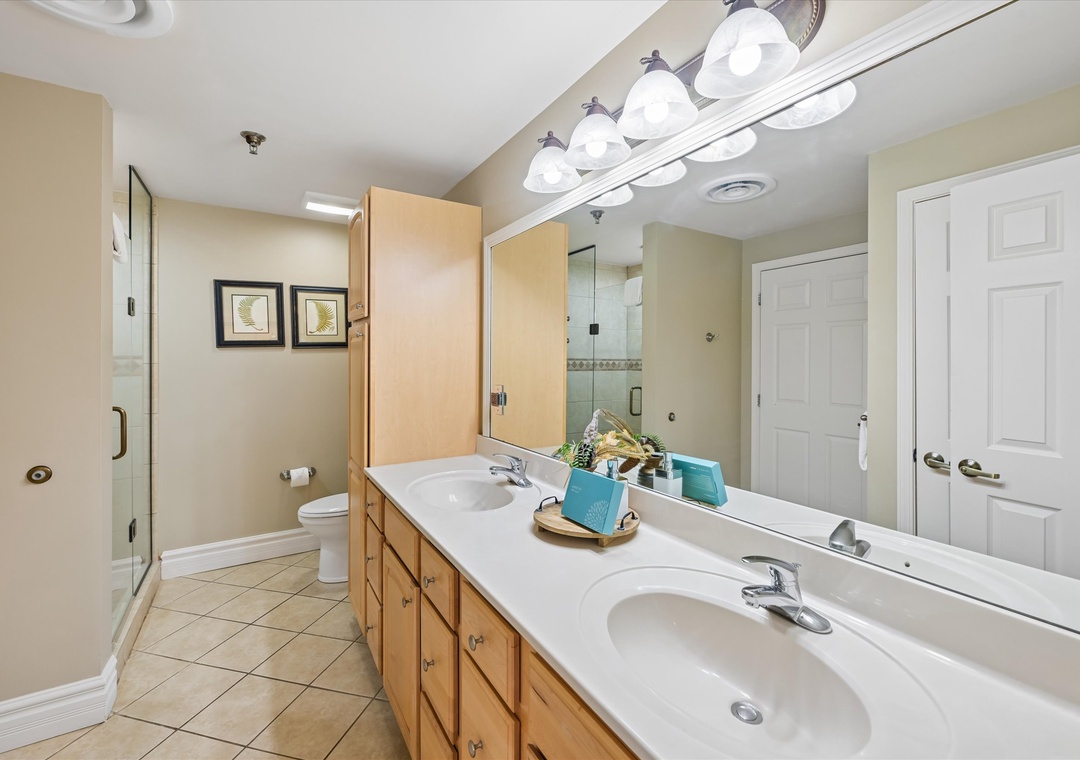 Your spacious master bathroom features dual vanities, perfect for getting ready together each morning with ample counter space.