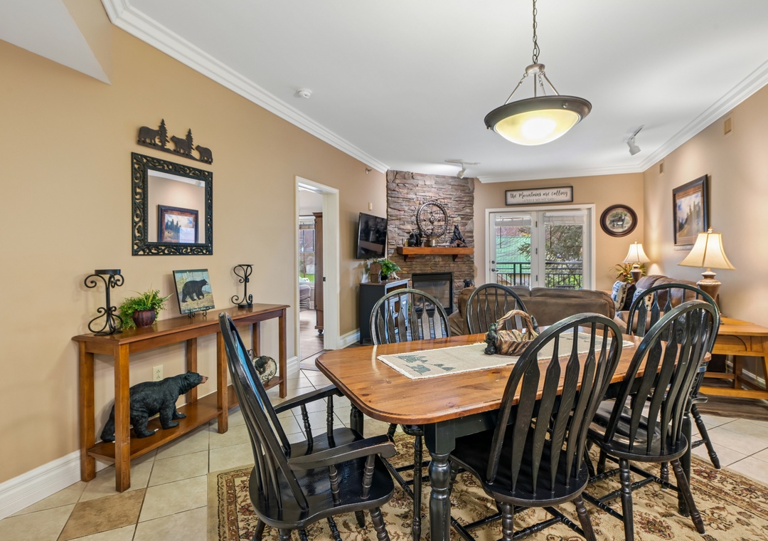 Gather around this rustic dining table where your family meals become cherished memories, surrounded by cozy mountain lodge charm.