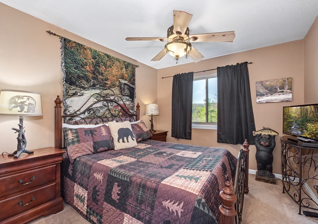 Drift off to sleep surrounded by rustic mountain charm—your cozy retreat features nature-inspired décor and peaceful forest views.