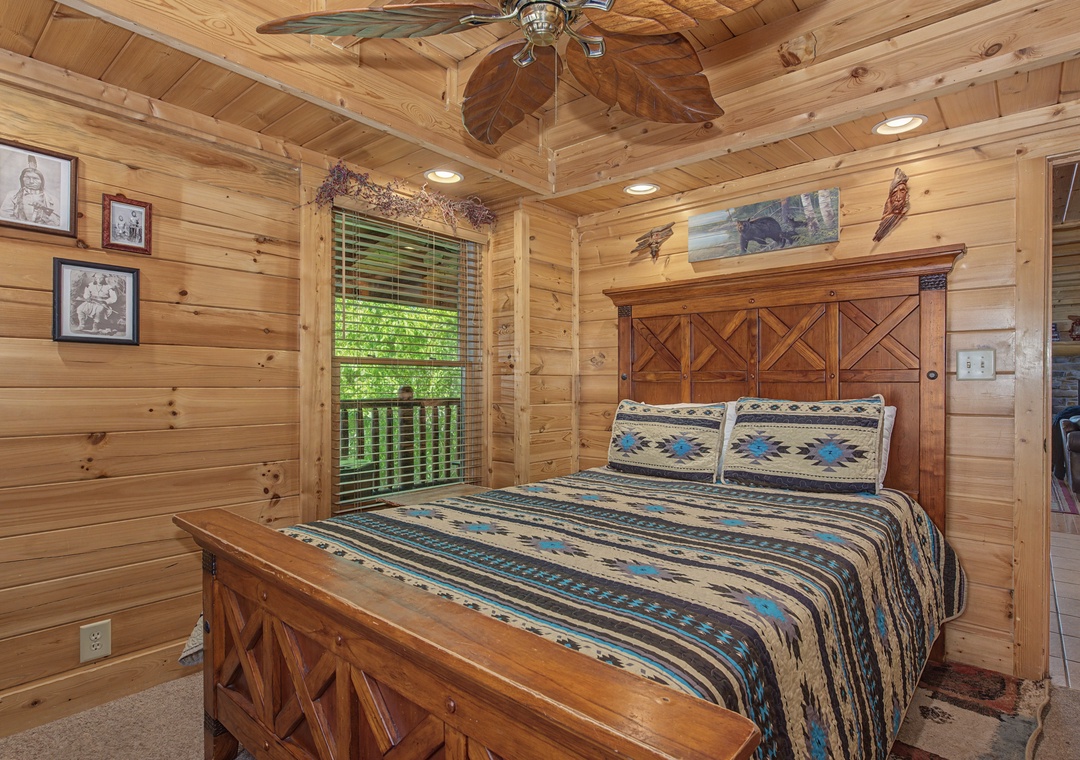 Drift off to sleep in your cozy log cabin bedroom, where rustic wood walls and Southwest-style bedding create the perfect mountain retreat sanctuary.