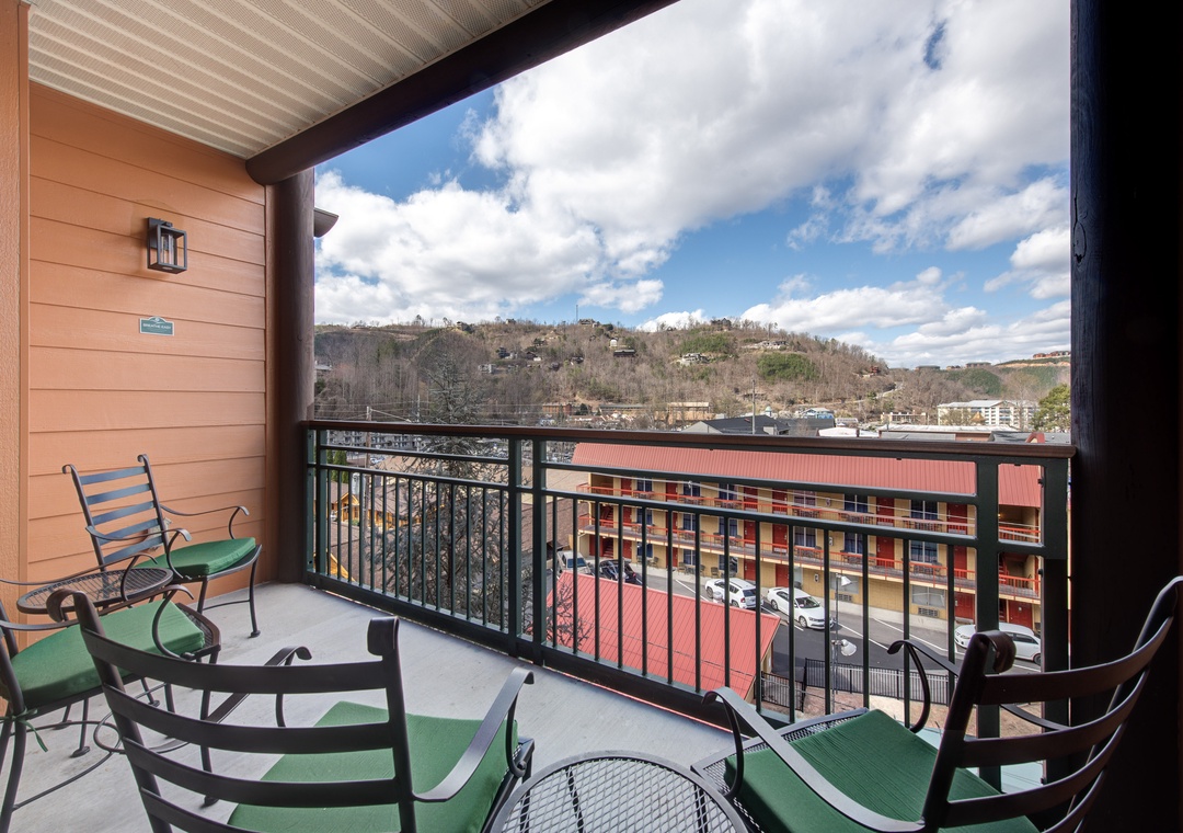 Unwind on your private balcony with mountain views, comfortable seating, and fresh air—perfect for morning coffee or evening relaxation.