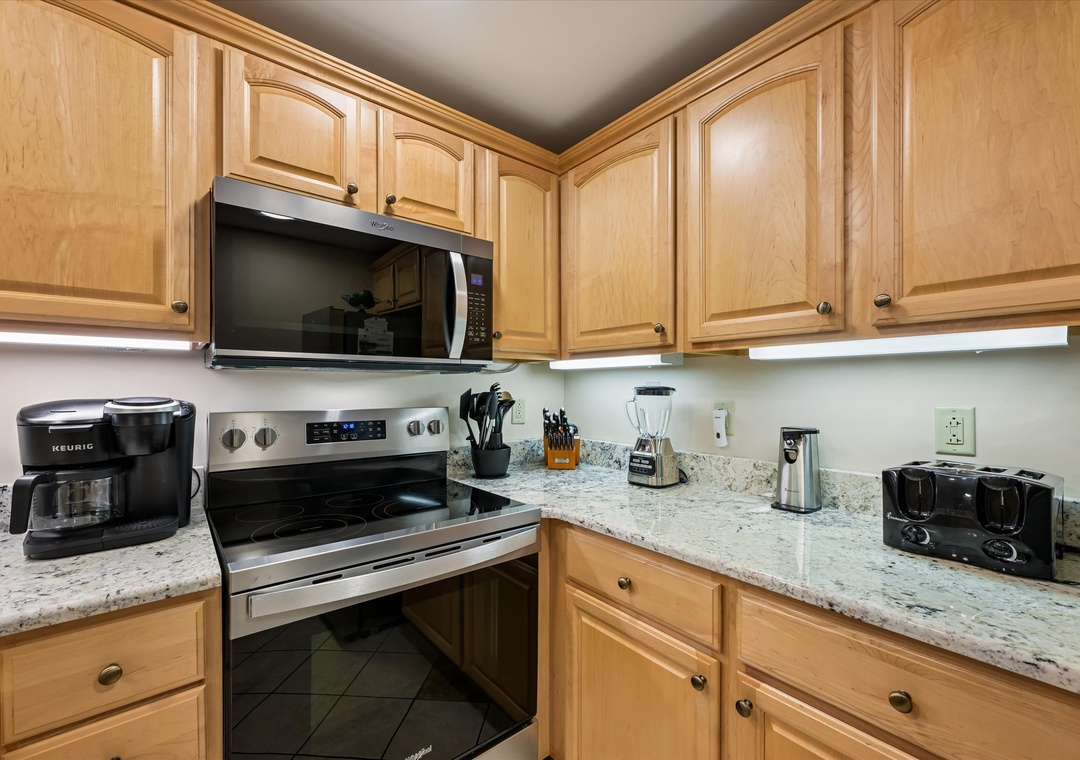 A well-equipped kitchen with granite countertops, modern appliances, and everything you need to whip up your favorite meals during your stay.