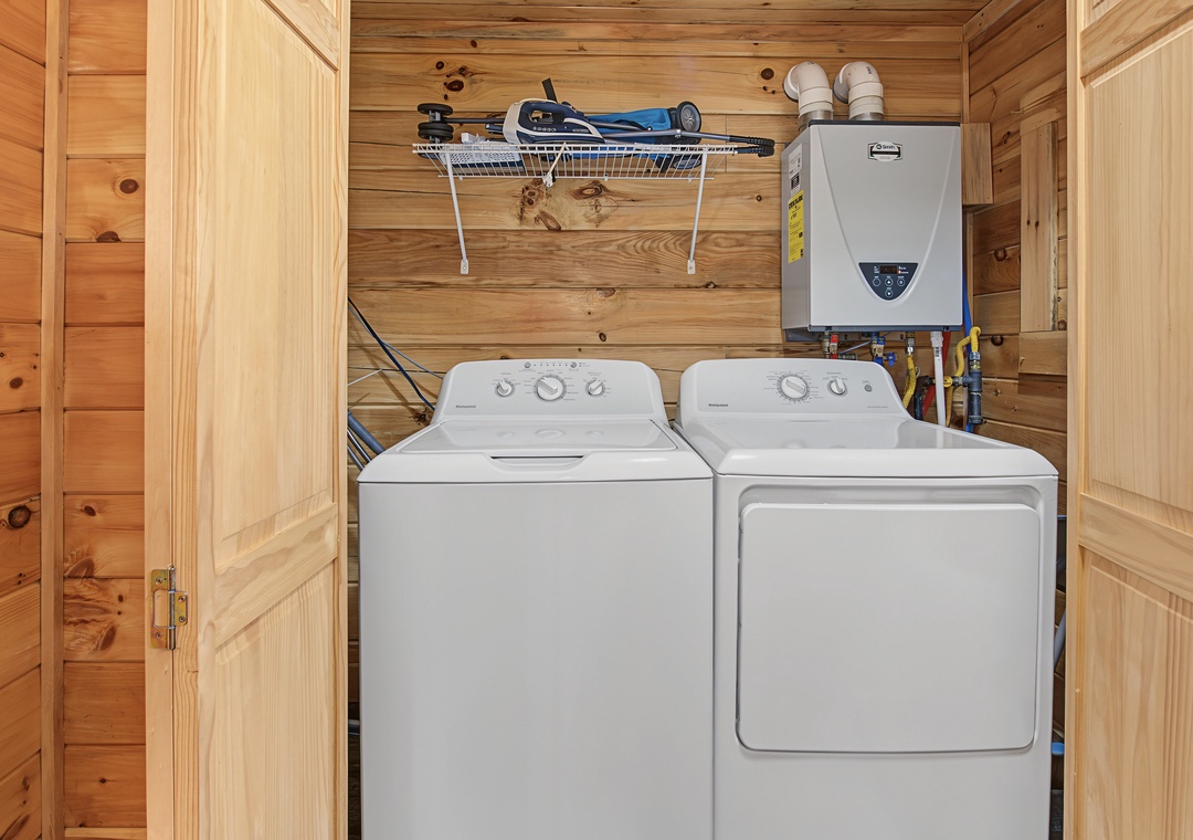 A full-size washer and dryer await in your warm wood-paneled laundry closet, making it easy to pack light and refresh your clothes during your stay.