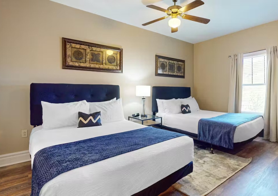 Your comfortable bedroom features two plush beds with crisp linens, perfect for sharing with family or friends.