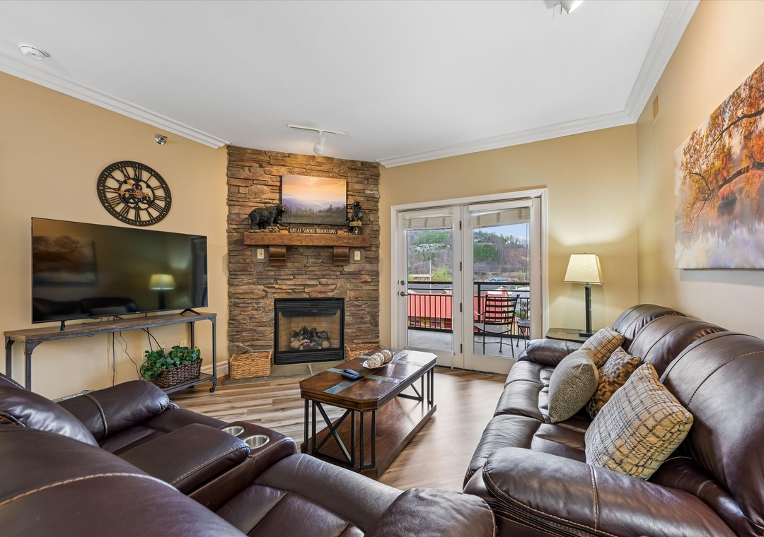 Sink into plush leather sofas by your stone fireplace, enjoying mountain views through French doors to your private balcony.