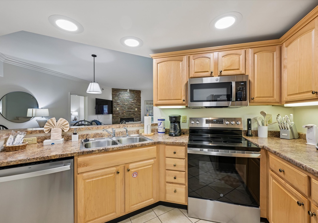 Your spacious kitchen awaits with granite counters, full appliances, and everything you need to create memorable meals during your stay.