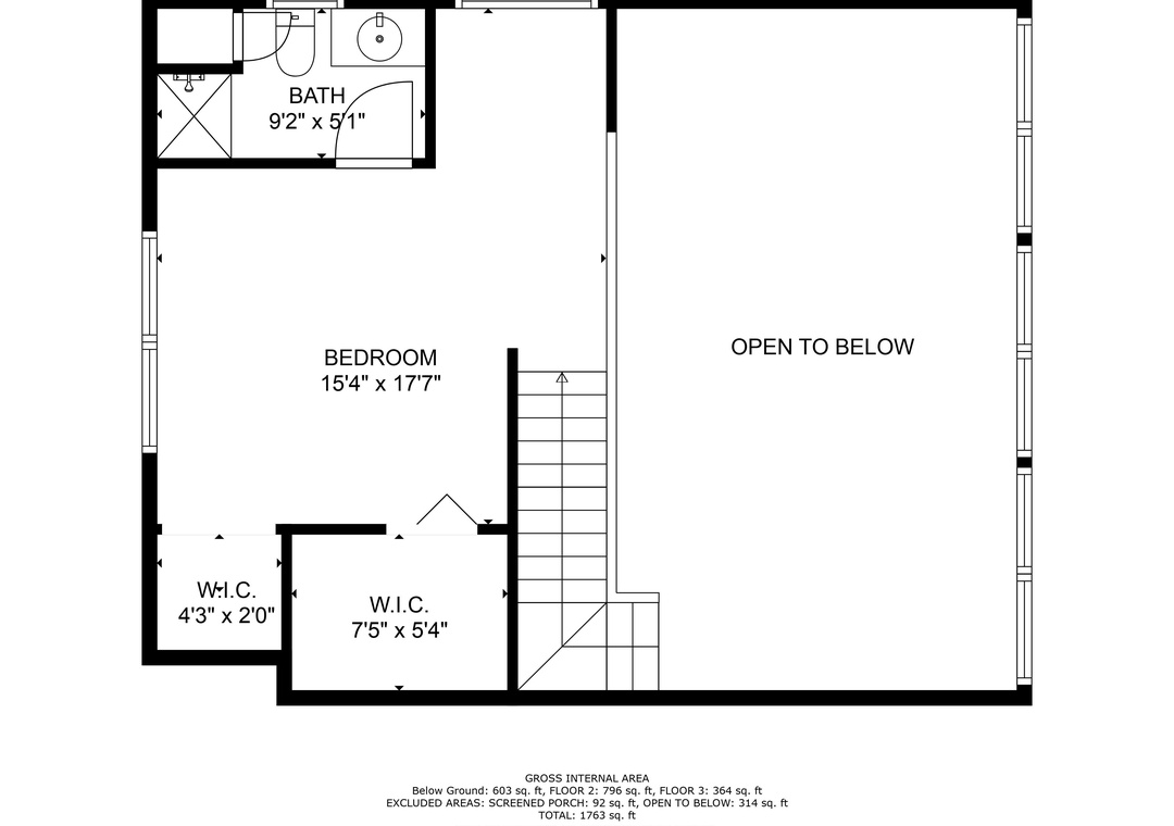 This floor plan shows a spacious bedroom with dual walk-in closets and a private bath—plenty of room to unpack and settle in for your stay.
