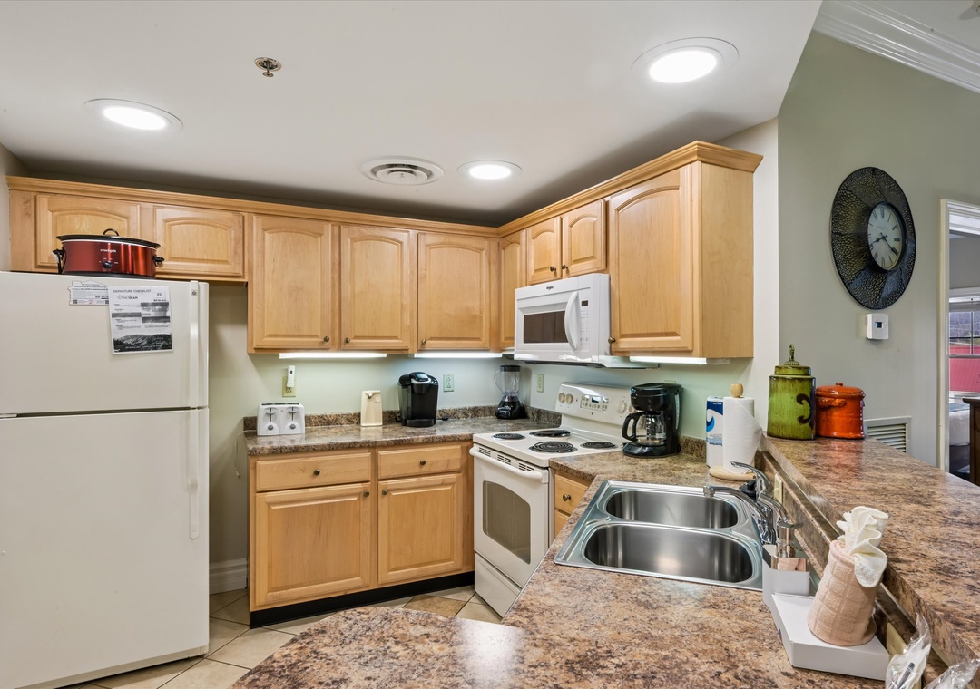Your fully equipped kitchen awaits with granite counters, modern appliances, and everything you need to create memorable meals during your stay.