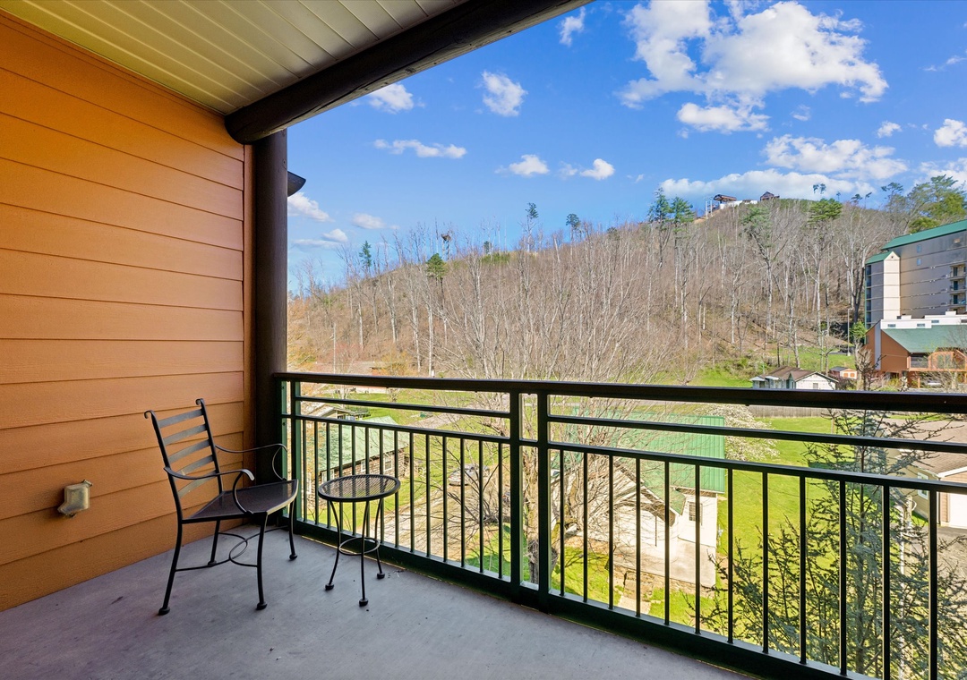 Step out onto your private balcony and soak in sweeping mountain views while enjoying your morning coffee on comfortable outdoor seating.