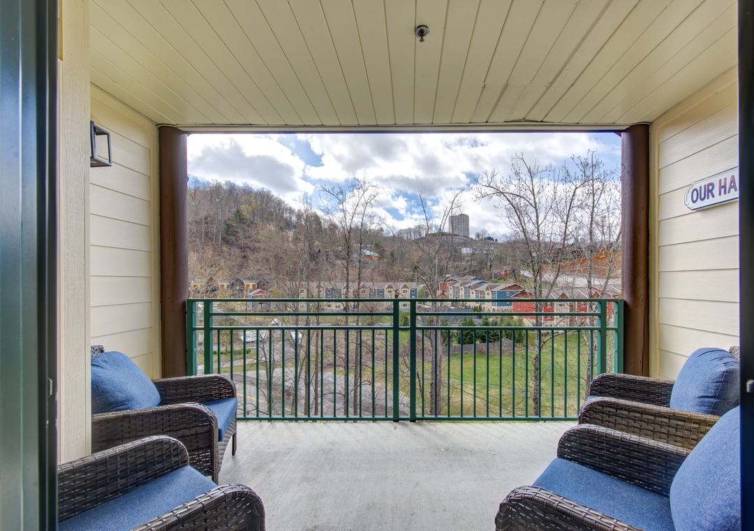 Your private balcony awaits with comfy seating and peaceful mountain views - perfect for morning coffee or evening relaxation.
