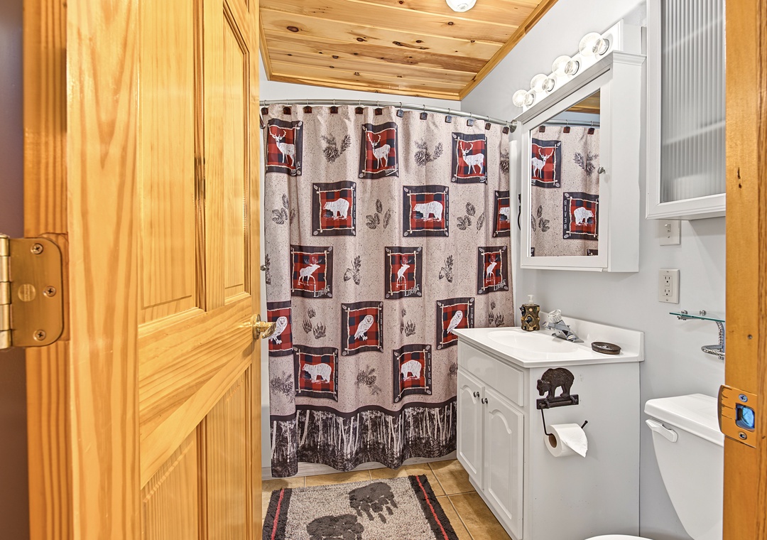 Step into your own cozy retreat with rustic charm, featuring warm pine wood ceilings and woodland-themed touches that bring the beauty of nature indoors.