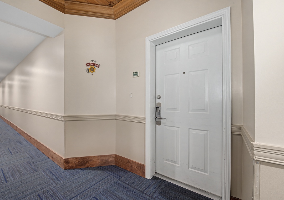 Step into your private retreat through this secure entrance, featuring electronic keypad access for your convenience and peace of mind.